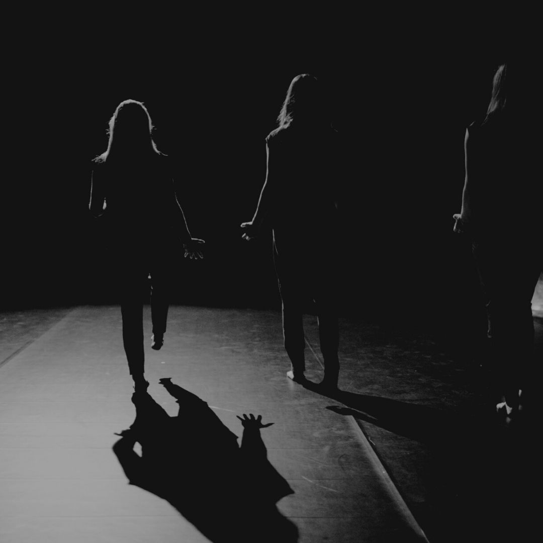 two dancers embracing 